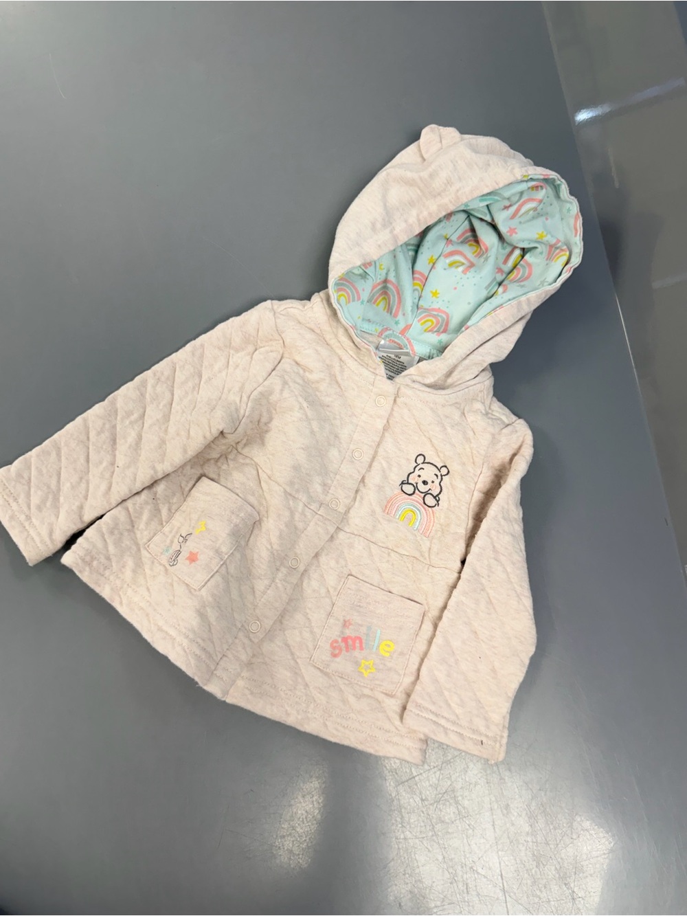 Baby Quilted Hooded Jacket in Light Pink with Rainbow Lining on the hood